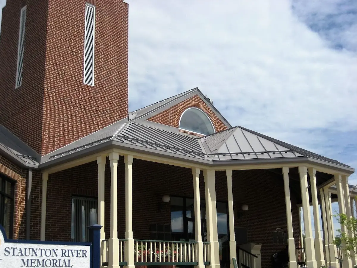 Skilled roofing craftsmen working on a residential roof in Kingsland